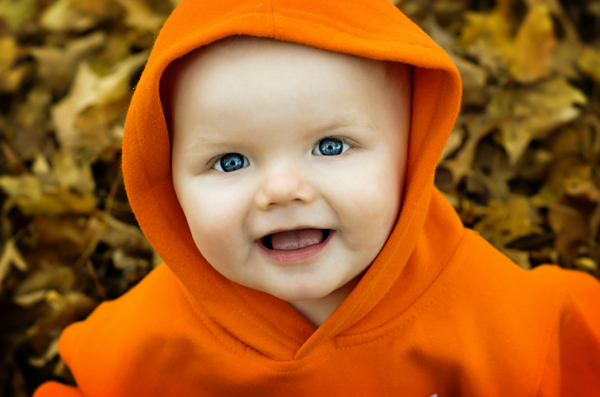 photo of a nine month old gummy grin